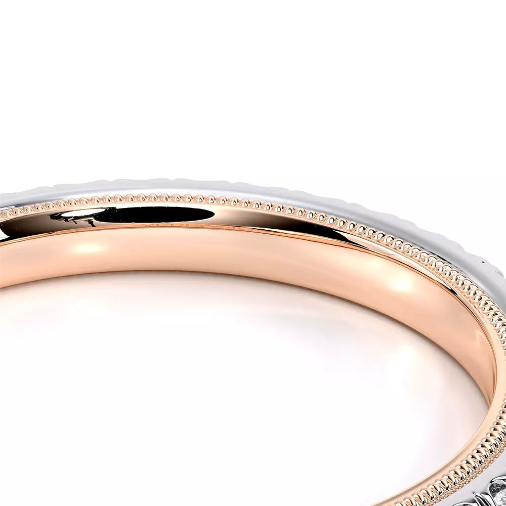 White and rose gold band with diamonds.