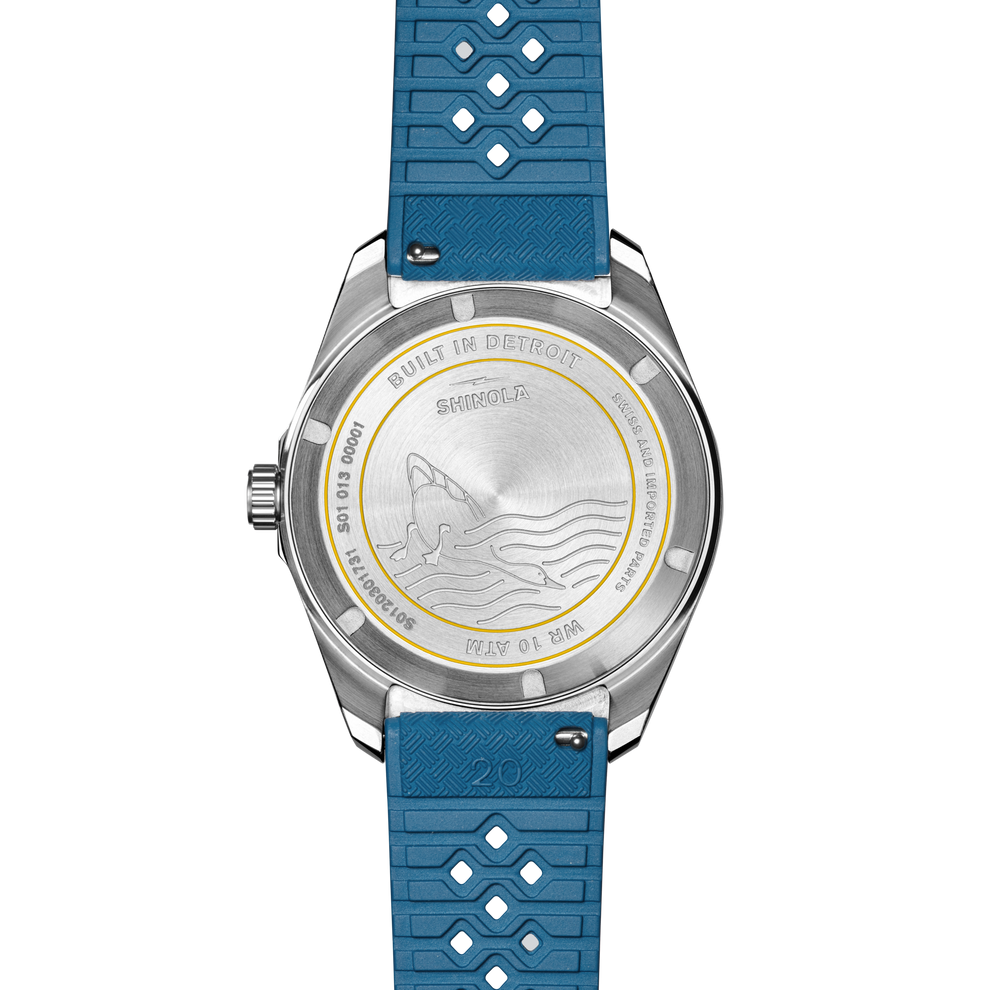 Blue rubber strap, stainless steel watch back.