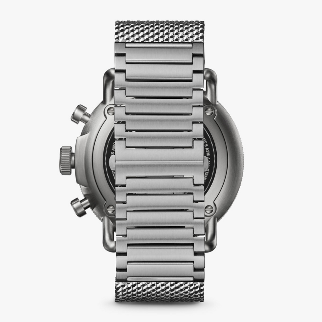 Stainless steel watch with textured band.