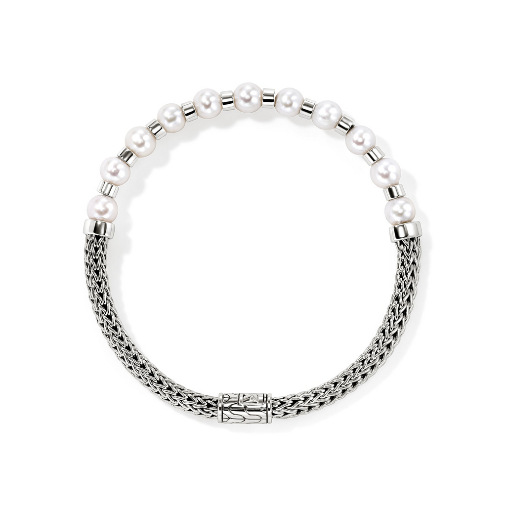 Sterling silver bracelet with cultured pearls.