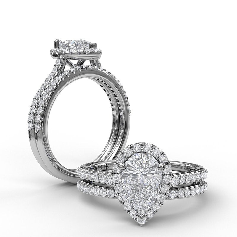 White gold halo diamond engagement ring.