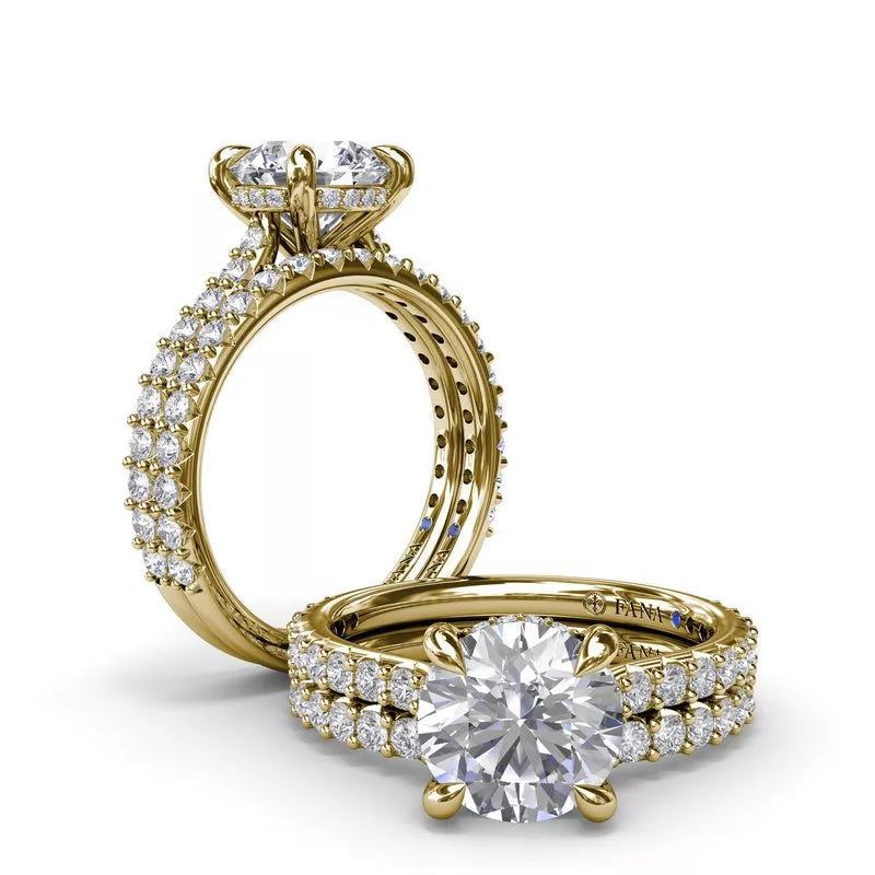 14K yellow gold diamond ring with side stones.