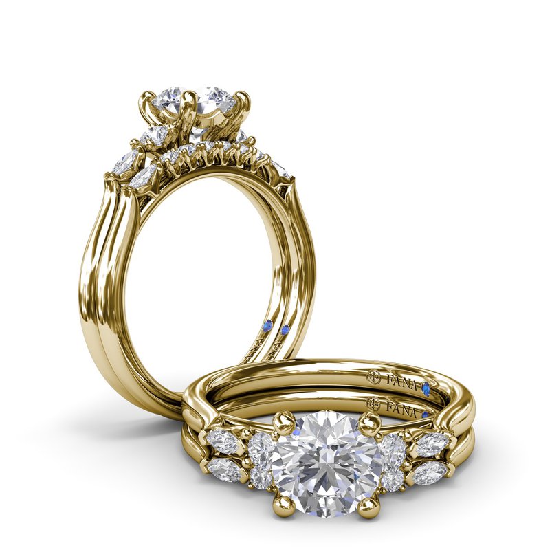 14K yellow gold band with mixed diamonds.