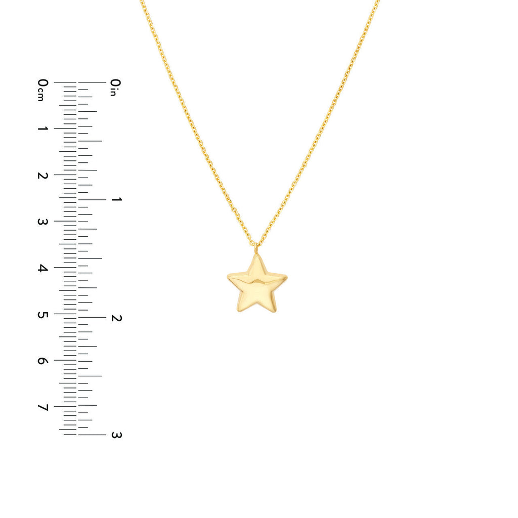 Star-shaped 14K yellow gold pendant necklace.