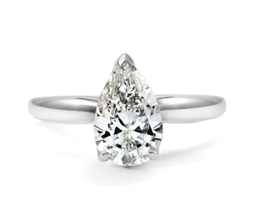 Pear-shaped diamond solitaire ring in white gold.