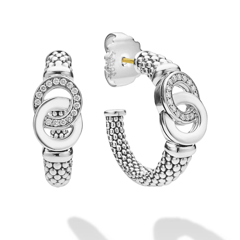 Sterling silver hoop earrings with diamonds.