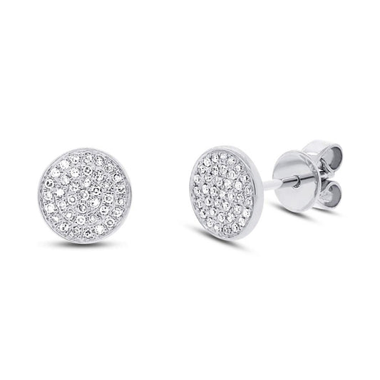 Round pave diamond earrings in white gold.