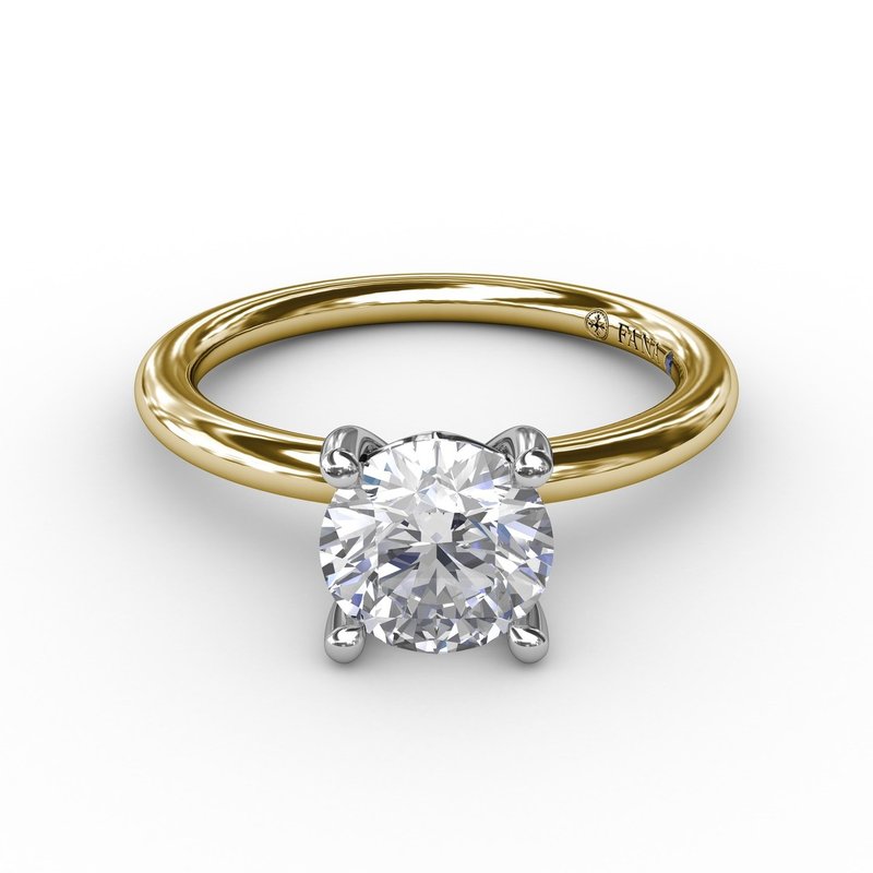 14K yellow gold ring with diamond centerpiece.