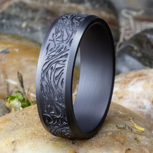 Carved tantalum grey band with matte finish.