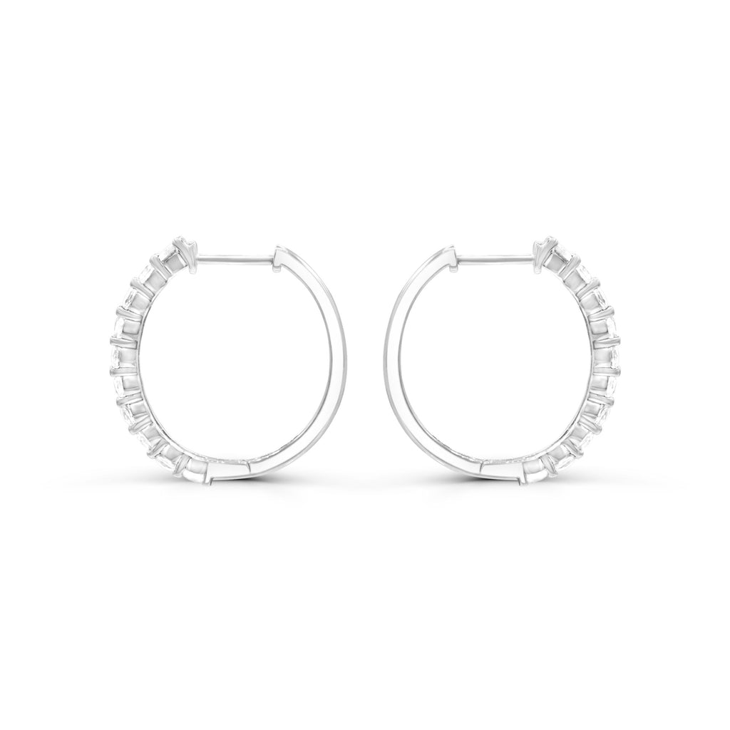 Sterling silver hoops with white sapphires.