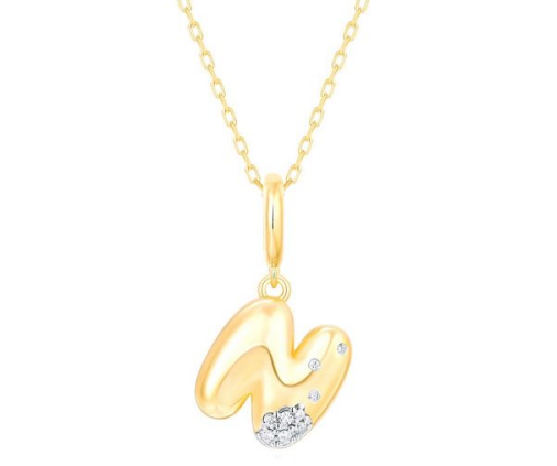 Yellow gold initial pendant with diamonds.