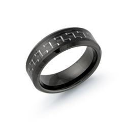 Black tungsten carbide band with carved design.