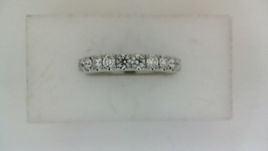 Expandable white gold band with round diamonds.