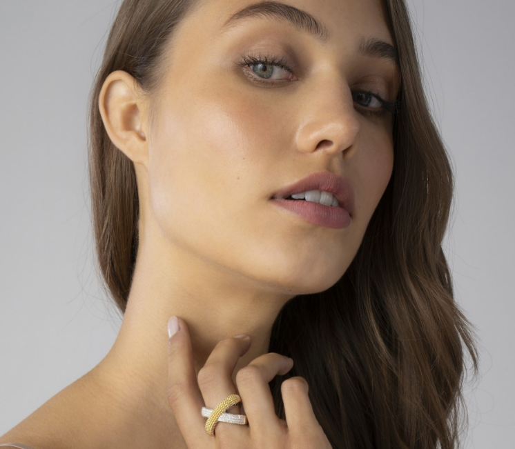 Sterling silver ring with diamond accents.