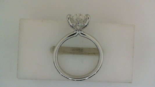 18K white gold solitaire engagement ring.