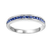10K white gold band with blue sapphires.