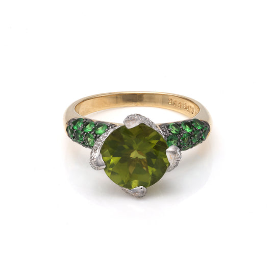 Peridot ring with Tsavorite garnets, white-yellow gold.