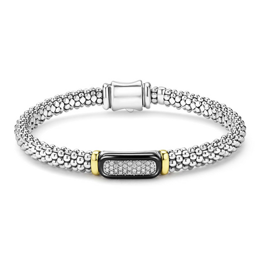 Sterling silver bracelet with diamond accents.