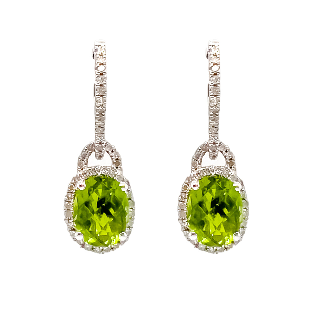 Oval quartz dangle earrings in white gold.