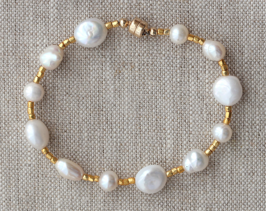 Gold-filled bracelet with white baroque pearls.