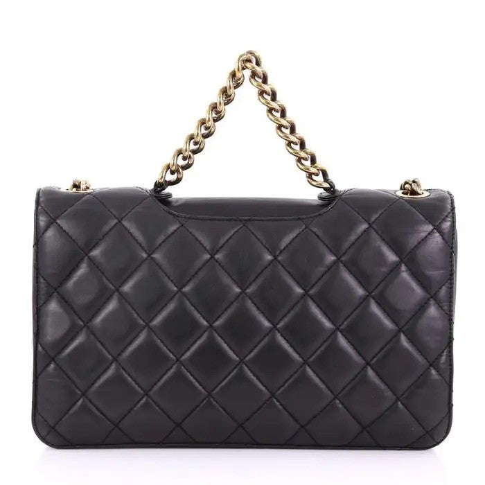 Black quilted leather handbag with chain strap.