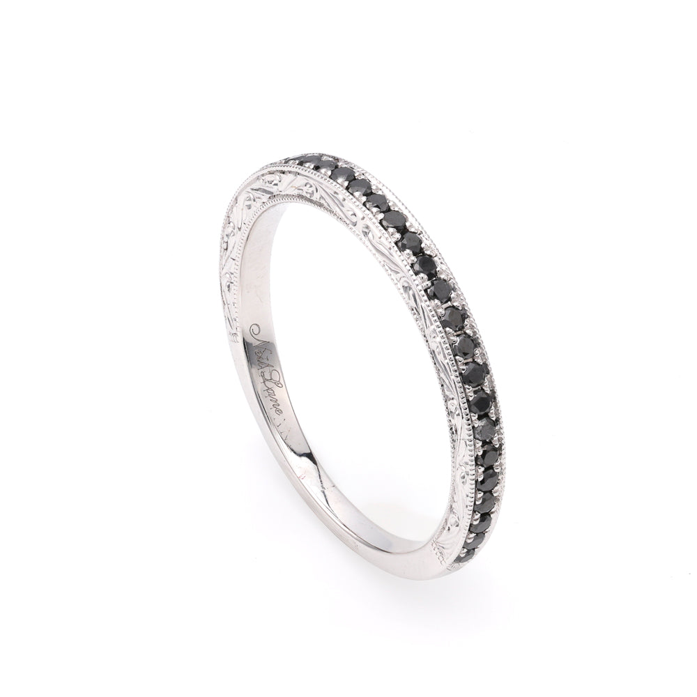 14K white gold band with black diamonds.
