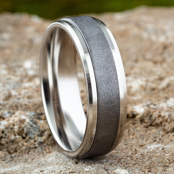 Tantalum carved band with wire brush finish.