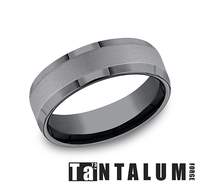 Tantalum grey carved band, polished satin finish.
