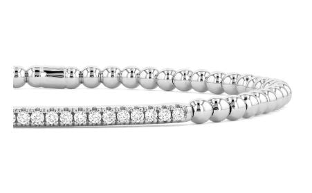 18K white gold bracelet with round diamonds.