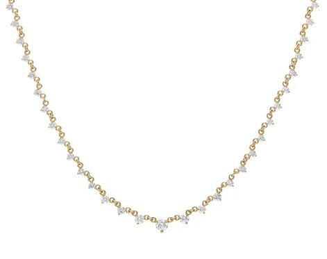 14K yellow gold necklace with round diamonds.