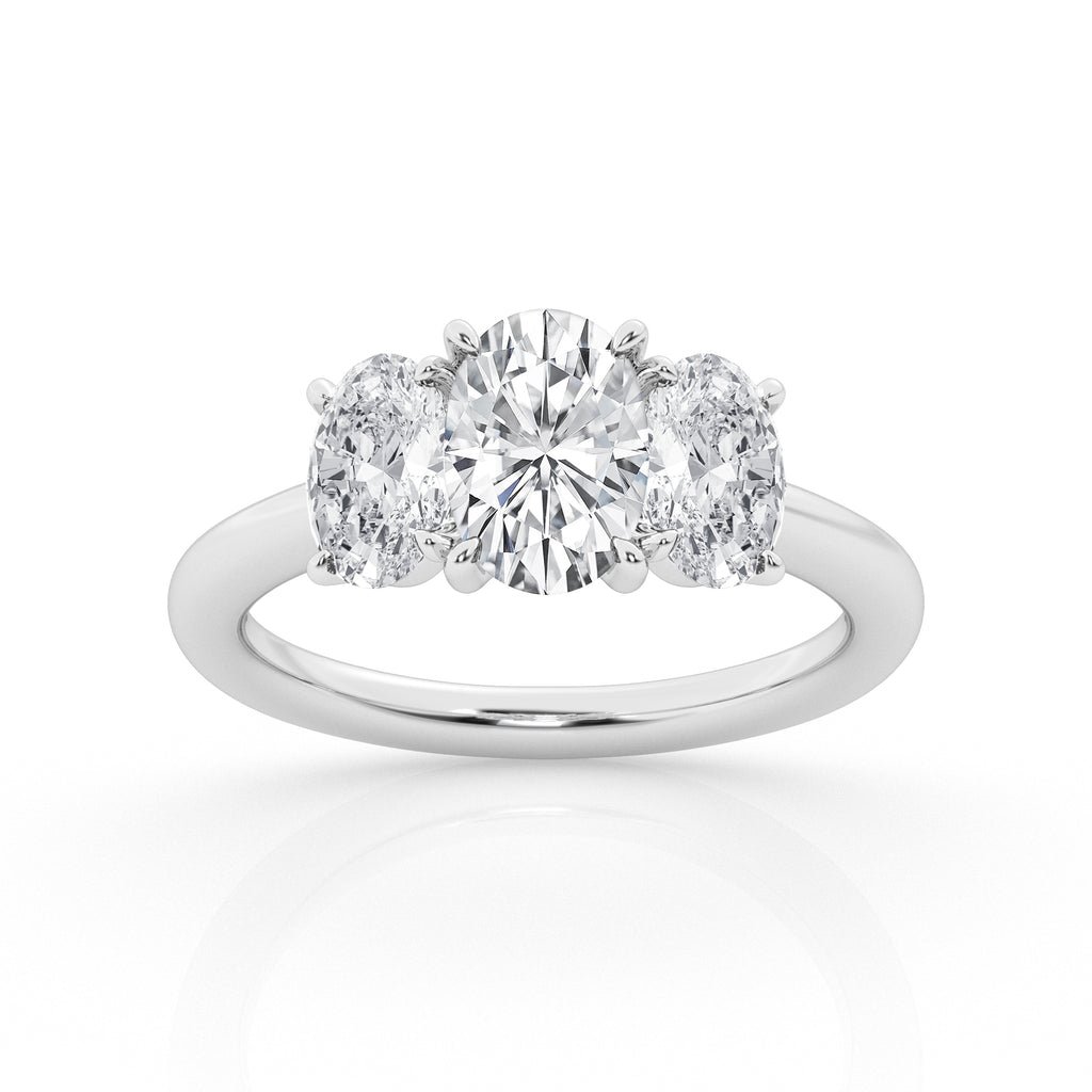 Three-stone oval diamond white gold ring.