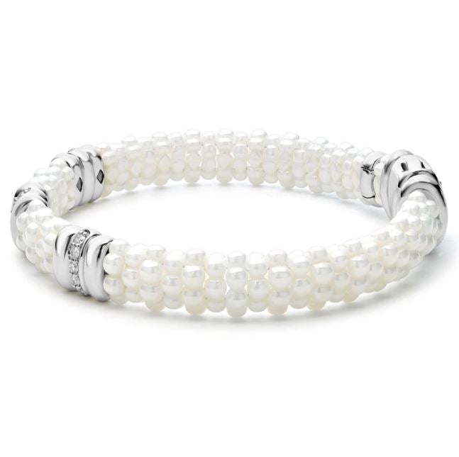 White ceramic bracelet with diamond accents.