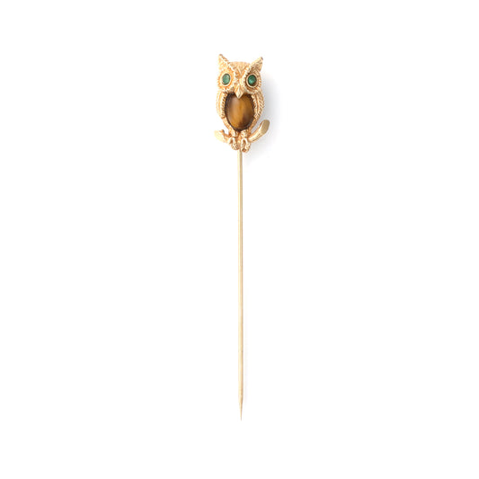 Owl-shaped brooch with Tiger Eye and emeralds.