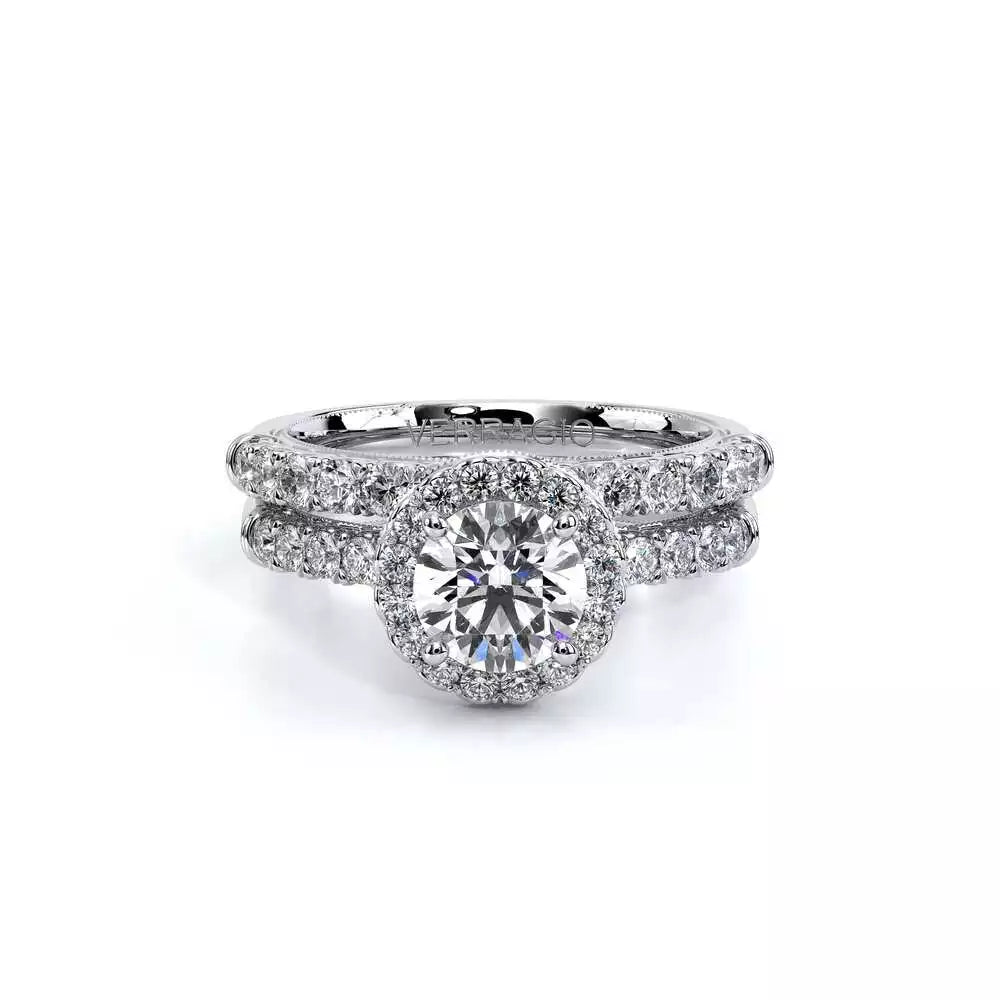 14K white gold diamond halo ring.