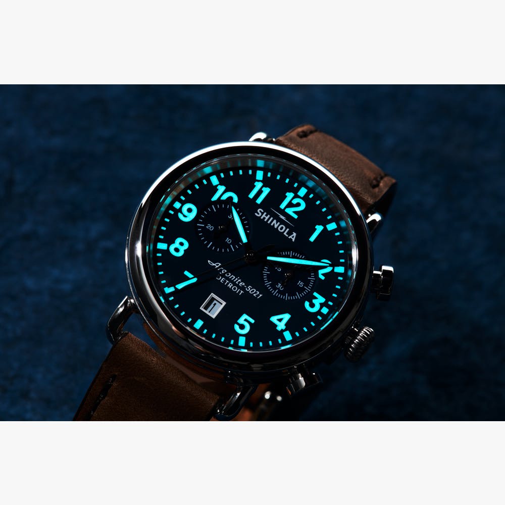 Blue dial, stainless steel case, leather band.