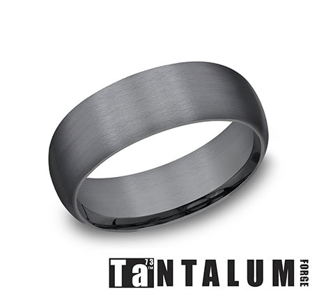 Dark grey tantalum carved band, satin finish.