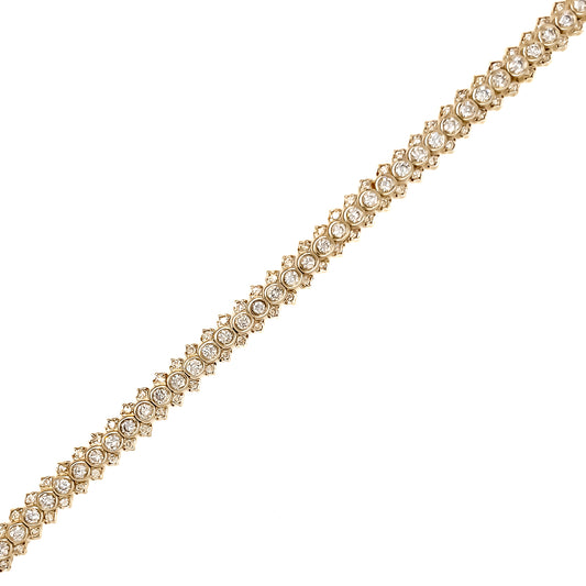 Yellow gold bracelet with round diamonds.