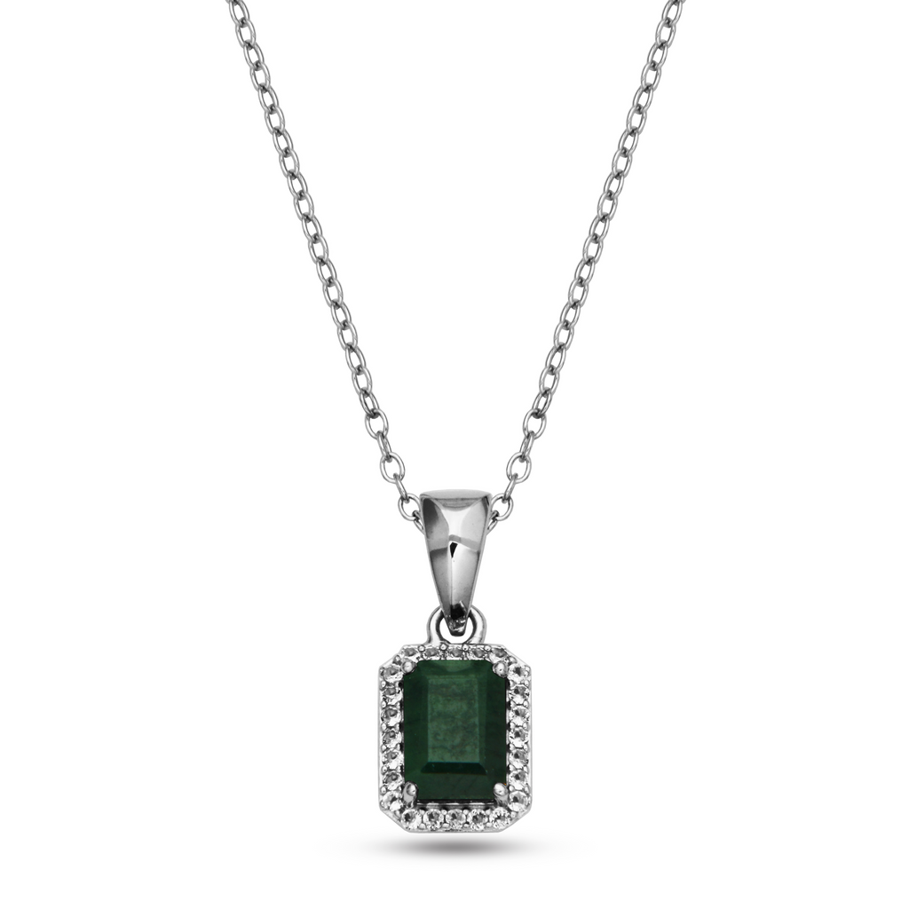 Emerald pendant with white topazes.