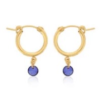 Gold hoop earrings with round sapphire dangles.