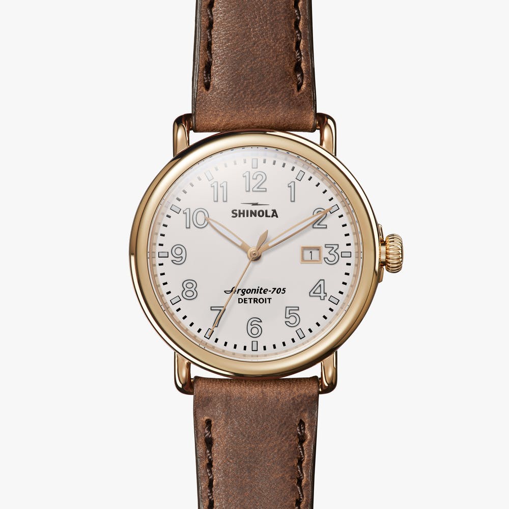 Shinola Runwell watch with brown leather band.