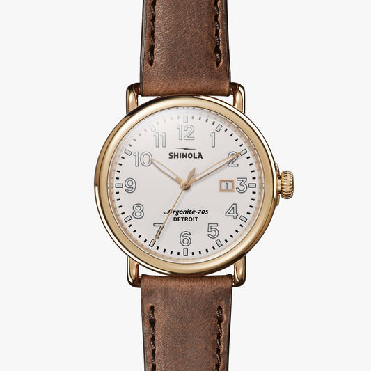Shinola Runwell watch with brown leather band.