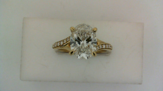 Side Stone Lab-Grown Diamond Complete Engagement Ring in 14 Karat Yellow with 1 Oval Lab Grown Diamond, Color: F, Clarity: SI1, totaling 2.01ctw