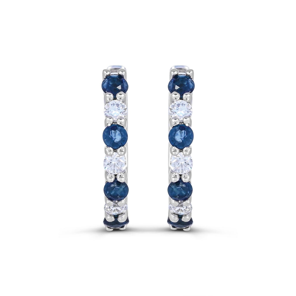 White gold hoops with sapphires, diamonds.