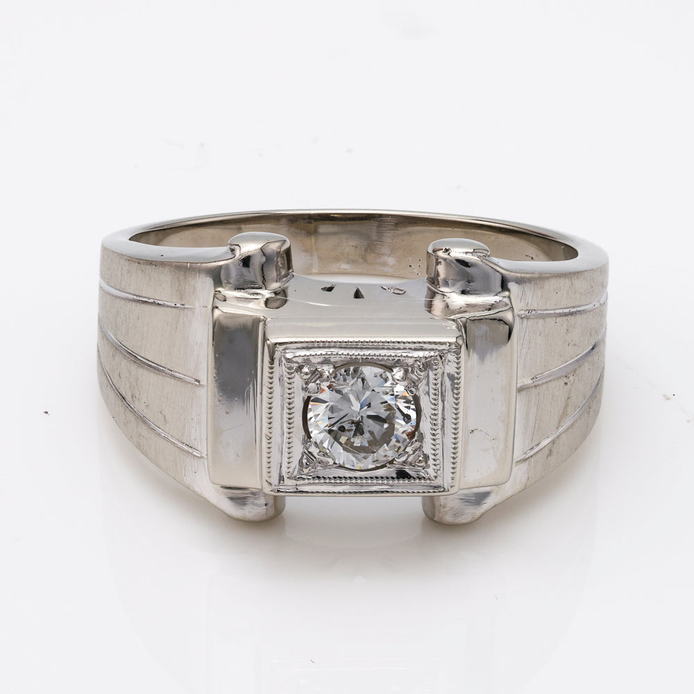 14K white gold ring with round diamond.