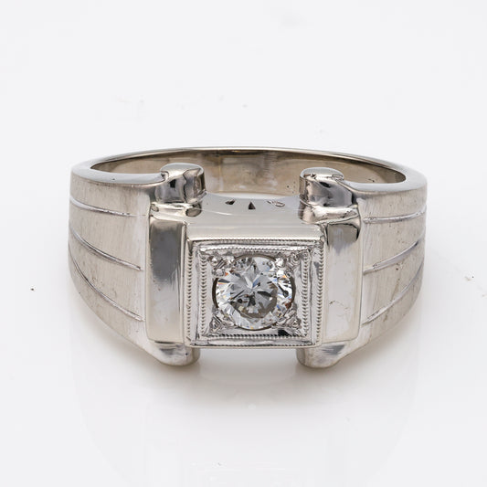 14K white gold ring with round diamond.