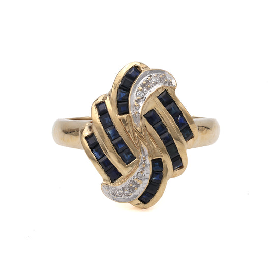 Yellow gold ring with sapphires and diamonds.