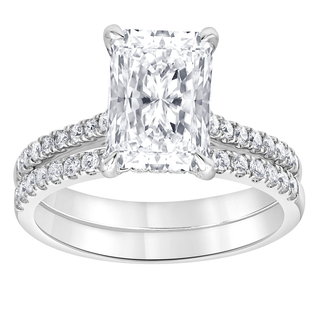 Radiant-cut diamond engagement ring with pavé band.