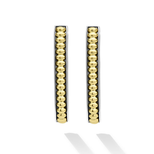Sterling silver oval hoops with beaded design.