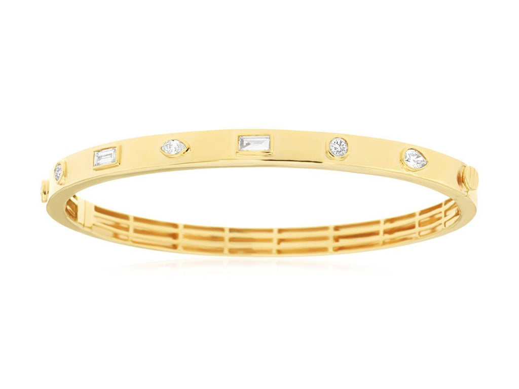 Yellow gold bangle with round diamonds.