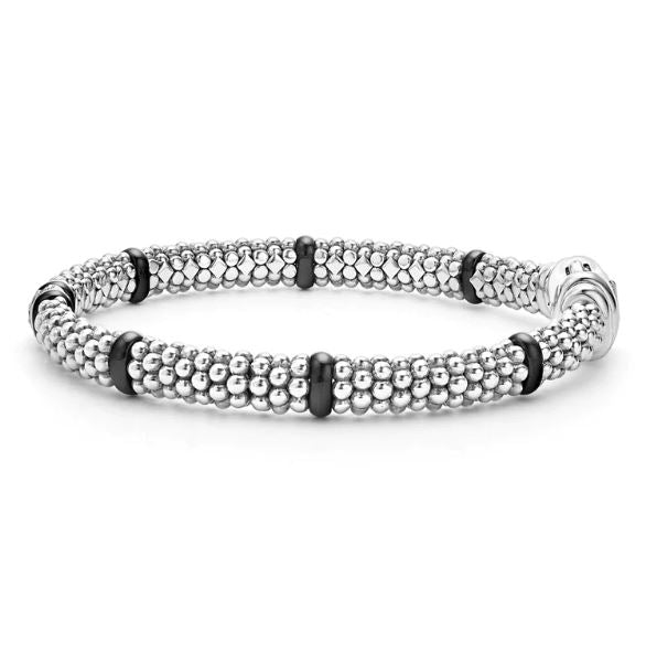 Sterling silver bracelet with black ceramic accents.